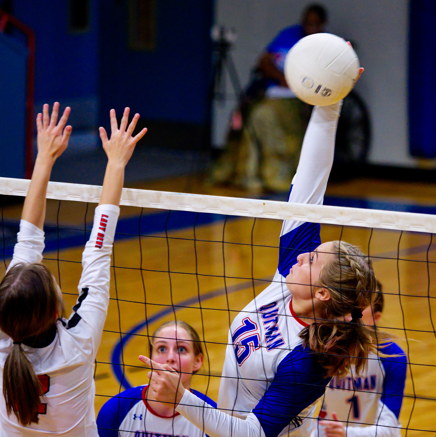Annabelle Popek slams a spike for Quitman. [view more volleyball shots]